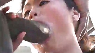 Lean Asian babe with nice ass deepthroats big black cock