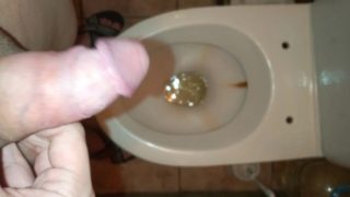 Femboy piss in public toilet.