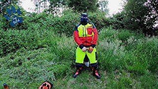 Forest Worker Pup pawing off in gear and boots (outdoors)