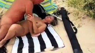 His girl with stranger at the beach