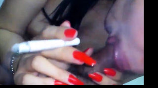 indonesian babe giving bj while smoking