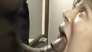 Horny bitch goes crazy sucking on a big black cock