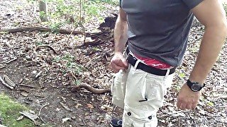 Horny in public, I stopped to jerk-off in the woods and cum on a log.