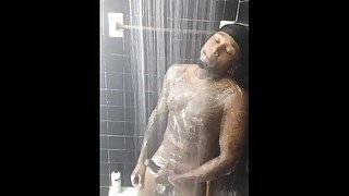 Tattooed  stud jerks dick in the shower