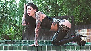 Tattooed pornstar Joanna Angel takes a long dick in her ass