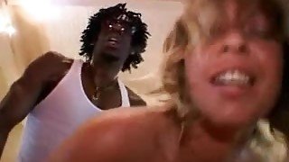 White blonde rubs black dick with boobs and gets ass fucked