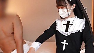 Japanese girl give a guy a hand job cosplayed as a nun