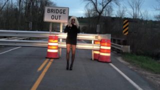 Female Mask and Tight Black Dress, High Heels, and Black Stockings