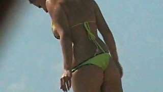 Spy cam video of my friend's curvy bitch flaunting her body in bikini