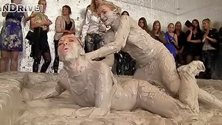 Vivacious blonde with a sexy body having a catfight in a mudbath