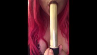 Pink haired girl gives dildo a blowjob 