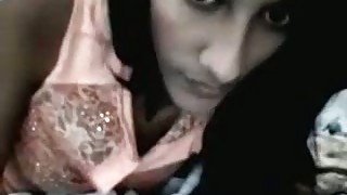 Webcam solo with an Indian chick flashing her tits