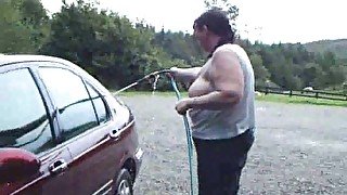 Mature bbw wife of mine washes my car flashing her big saggy tits