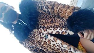 Asian Sissy Ladyboy Walking in the City in Leopard Coat