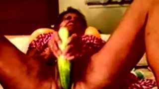 Granny amateur using a huge cucumber, cuming and squirting