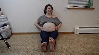 TSM - Rhea rubs her pregnant belly while posing her feet