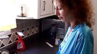 MILF takes huge cock in kitchen