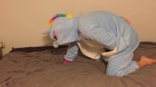 Spanking in unicorn onesie with ridding crop 