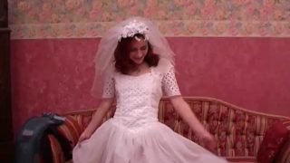 Redhead bride being taken