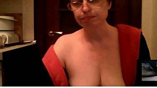 Mature nerdy nympho teased me with a nice topless show on webcam