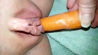Chubby Australian gf pokes her meaty cunt with carrot