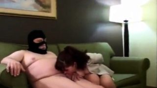 Elegant milf banged hard by a masked stranger on the couch