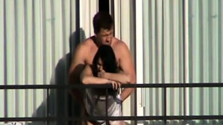 a coach fucks his girl out the balcon