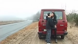 Long haired milf sucks a thick cock and gets slammed in the back of a van