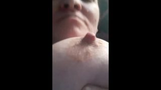 Licking and sucking my hard big nipples for you