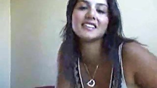 Hot girl rubbing lotion on her tits on webcam
