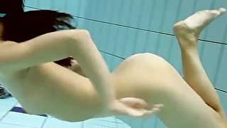 Dark swimming pool and hot Russian girl