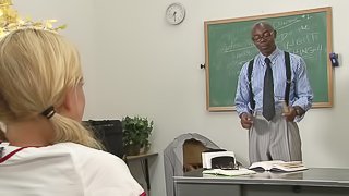Pigtailed blonde girl takes her teacher's big black cock in an interracial scene