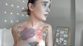 Inked amateur teen shows me her bald pussy on webcam!