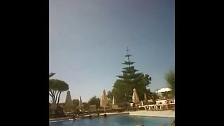 Topless girl in pool