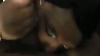 Black slut takes massive cock in her mouth before going to bed