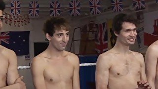 Handsome young men testing their brawn in the ring