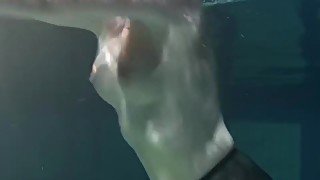 Dressed underwater beauty Bulava Lozhkova swimming naked