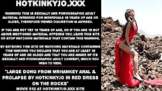 Large dong from mrHankey anal & prolapse by Hotkinkyjo in red dress on the rocks