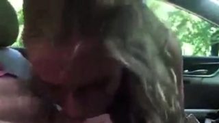 Excited Blonde Blowing In A Car