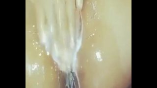 Ebony squirting and creaming at the same time