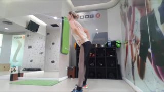 Cute blonde doing her warmup at the gym