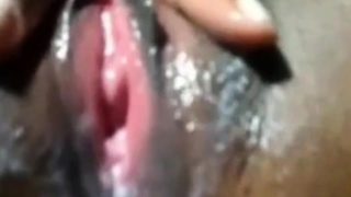 Sexy ass black girl strokes her wet pussy