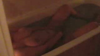 Sensual brunette wife masturbates in bathtub and cums hard