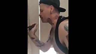 Sucking BBC at a gloryhole