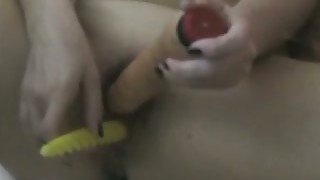 My horny busty wife masturbates with two big dildos