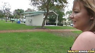 Mature blonde slut sucks a dick in the park