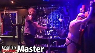 English Leather Master flogs on St Andrews Cross in dungeon PREVIEW