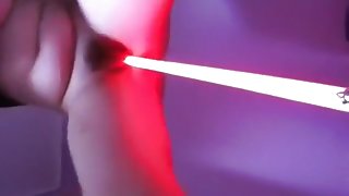 Star wars girl masturbates with a light saber