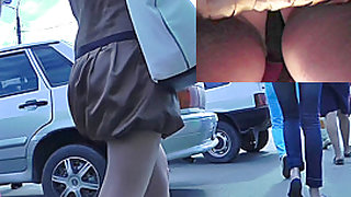 Upskirt spy camera filmed brunette's awesome ass