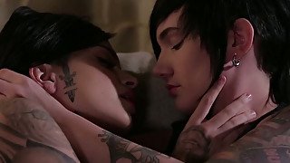 Inked lesbian slut Nikki Hearts kisses like a pro and she loves to eat pussy